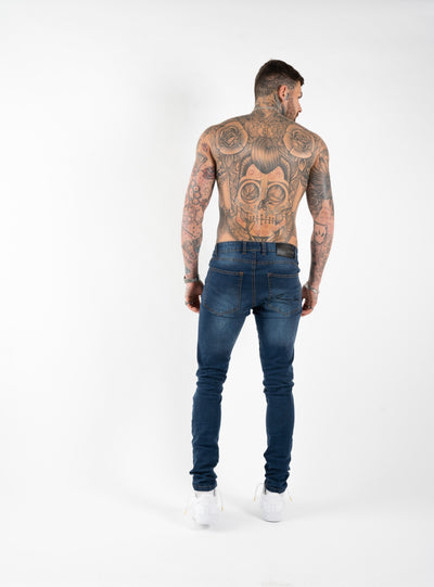 SPRAY ON RIPPED AND REPAIRED JEANS - BLUE