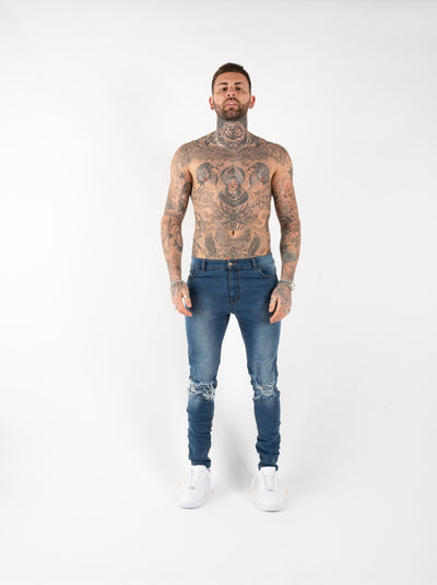 SPRAY ON KNEE RIPPED JEANS - BLUE