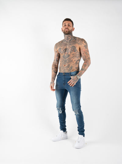 SPRAY ON KNEE RIPPED JEANS - BLUE