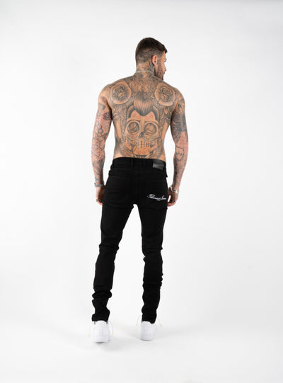 SPRAY ON RIPPED AND REPAIRED JEANS - BLACK
